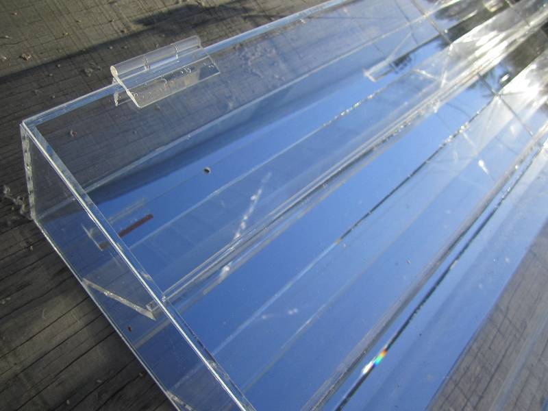 lot 98 image: Mirrored NASCAR replica or other collector items.  Measures 40.5 x 11.5 x 4 Mirrored back highlights all angles of your display.  Nice clean acrylic construction in good shape