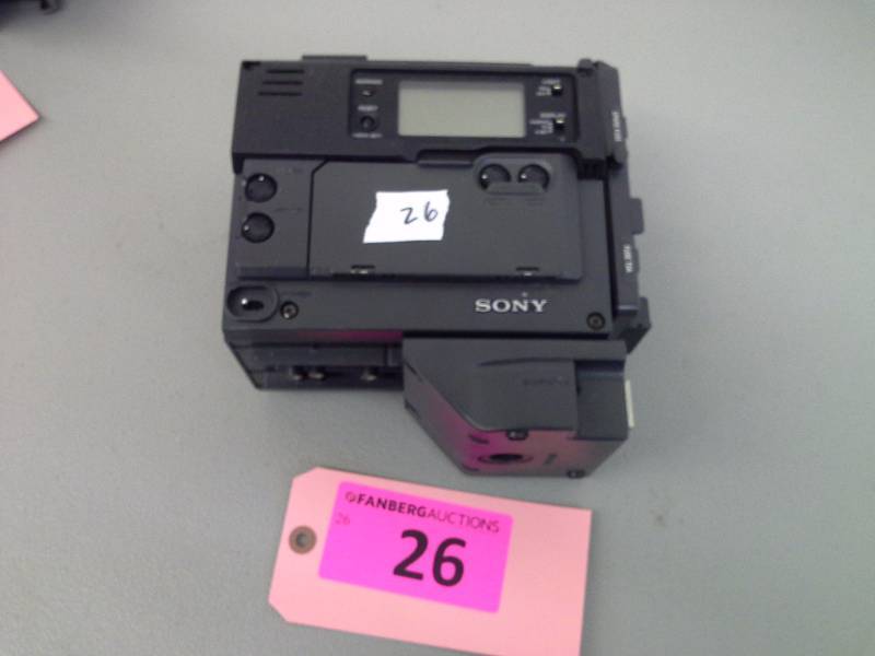 lot 26 image: (1) Sony DV Cam backpack DSR-1