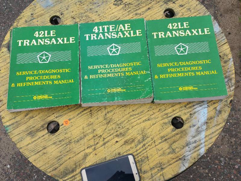 lot 127 image: (3) Chrysler Manuals