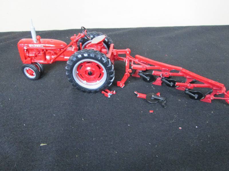 lot 69 image: Farmall Toy Die cast Tractor