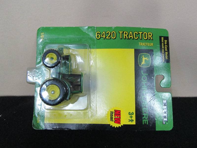 lot 71 image: Ertl John Deer 6430 Toy Tractor
