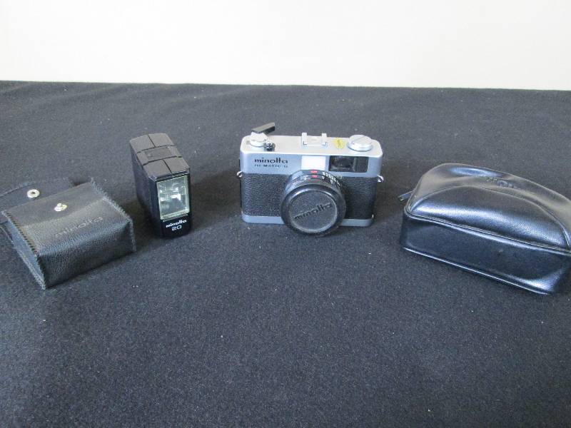 lot 104 image: Minolta Hi Matic G & Flash