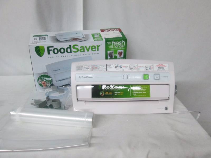 lot 21 image: FoodSaver Vertical Design Vacuum Sealing System