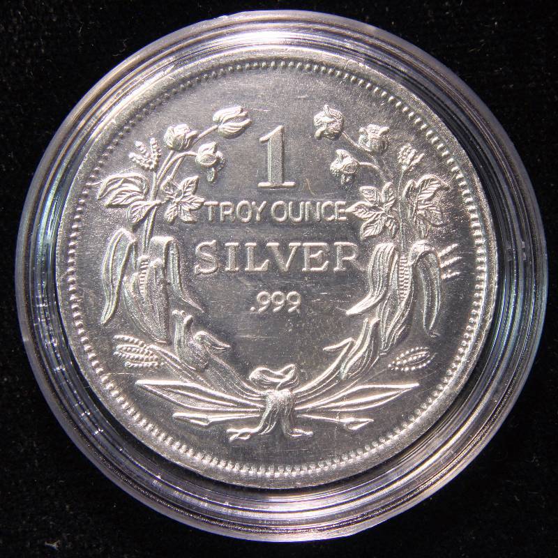 1 TROY OZ. .999 FINE SILVER SEATED LIBERTY DESIGN IN AIRTITE HOLDER