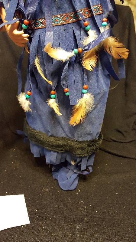 Lot of two Porcelain dolls, one Native american and one Vintage blonde doll
