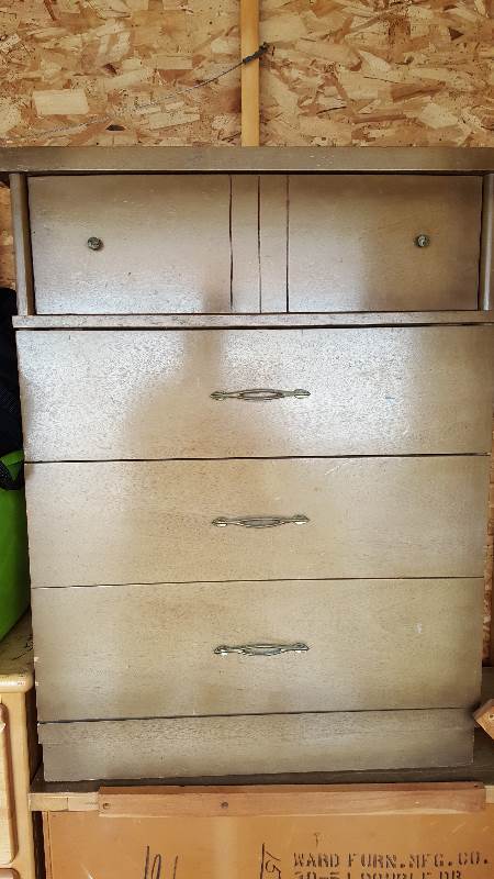 Four drawer brown dresser