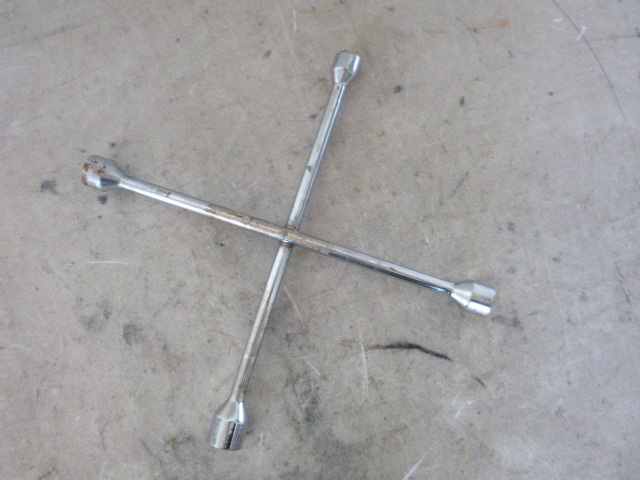 lot 27 image: 4-Way Tire Wrench