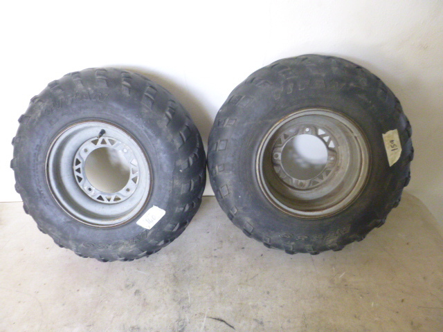 lot 33 image: 2 Polaris Trail Boss Tires and Rims