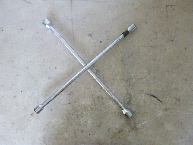 lot 39 image: 4-Way Tire Wrench