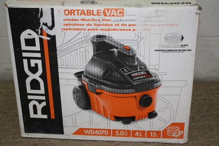 lot 16 image: Ridgid Portable WetDry Vac (4 gallon)