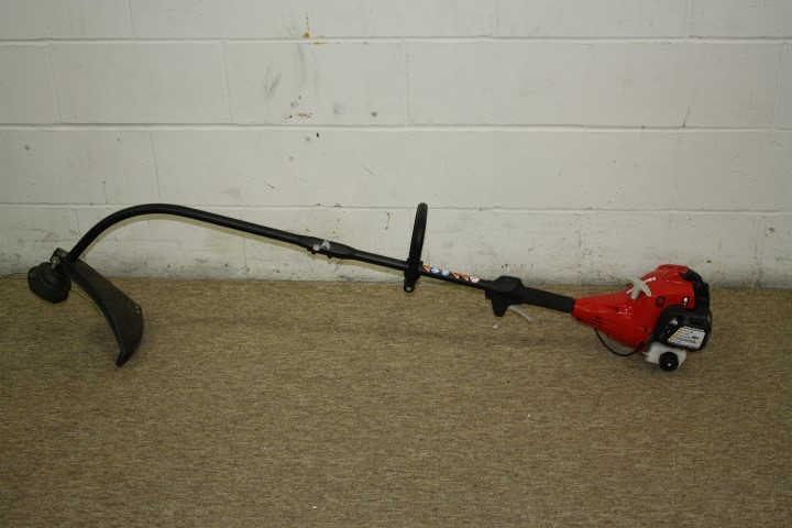 lot 38 image: Homelite Curved Weed Whip