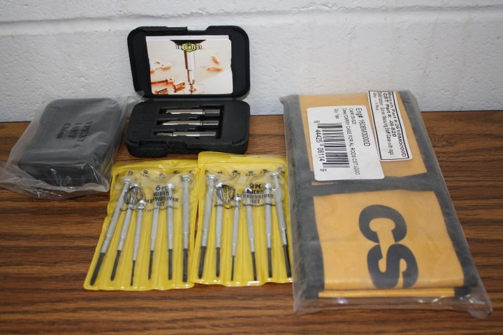 lot 56 image: Screw remover, screw driver set and carrying case.