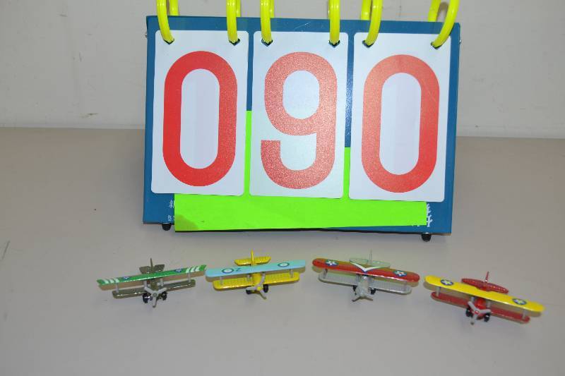 lot 90 image: Miniature Biplanes