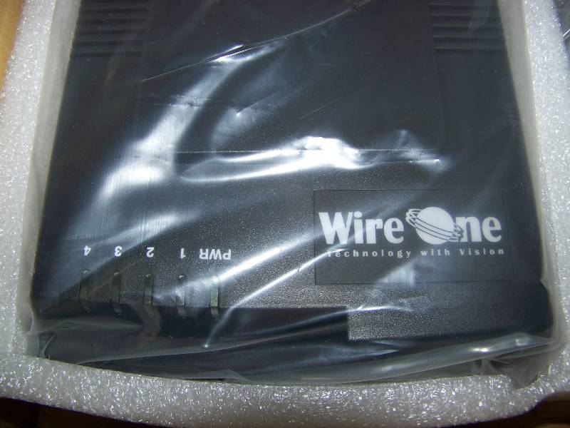 lot 57 image: WireOne, ISDN Interface Module with Power Supply and Cables - BRAND NEW