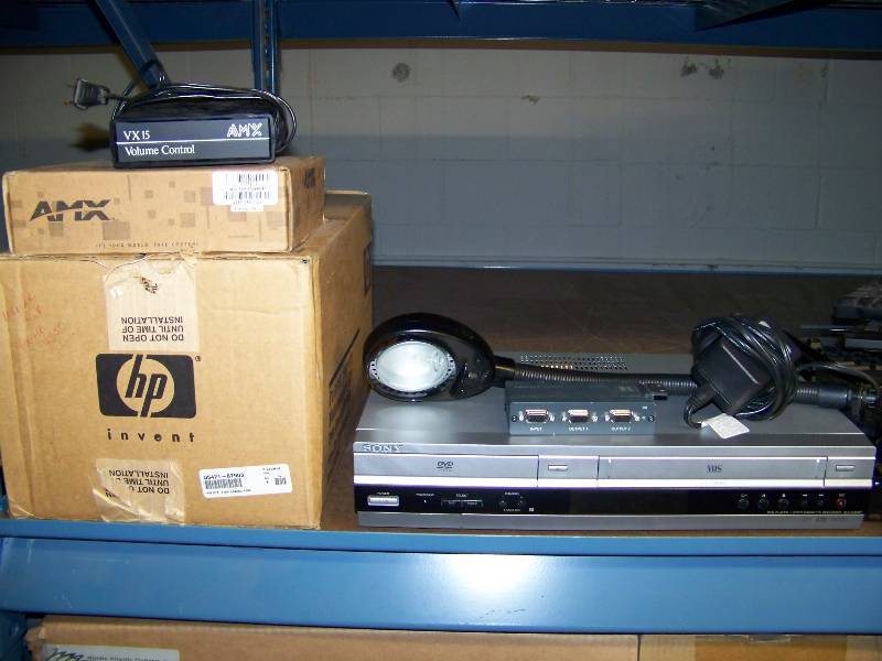 lot 46 image: (3) 8 Wide, Shelves of Miscellaneous Audio  Video  Computer Items, Cables, Electronics and more