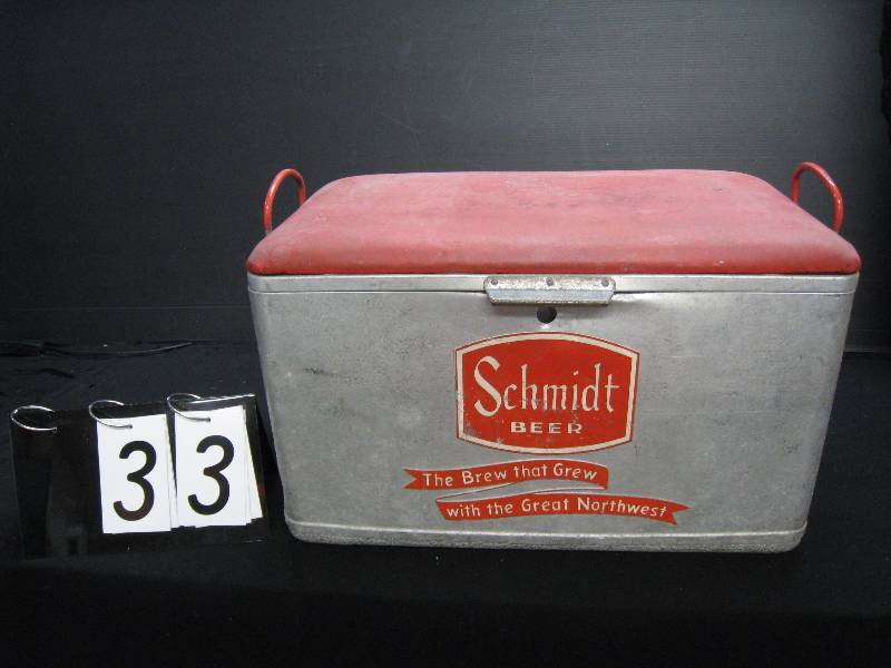 lot 33 image: Schmidt cooler, all original, vinyl padded seat  lid, well made - so you know its old, embossed with Quality Constroms Service Made in Minneapolis, lock is missing - someone Needed a beer