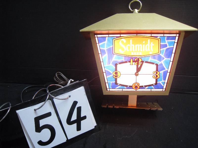 lot 54 image: Schmidt Beer coach lamp  clock originally meant to mount on a cash register - NOS New Old Stock