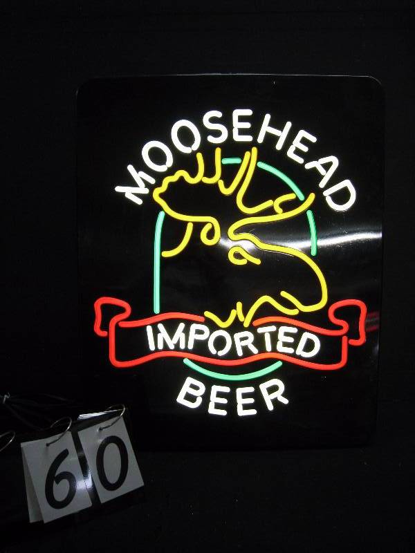 lot 60 image: Moosehead neon look, plastic embossed face, back lit sign