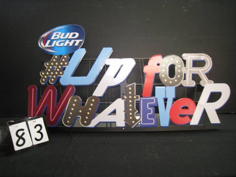 lot 83 image: Bud Light #UpForWhatever cardboard with cool mixed letter fonts