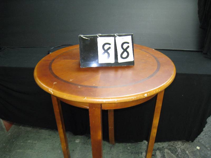 lot 88 image: Wooden cocktail table