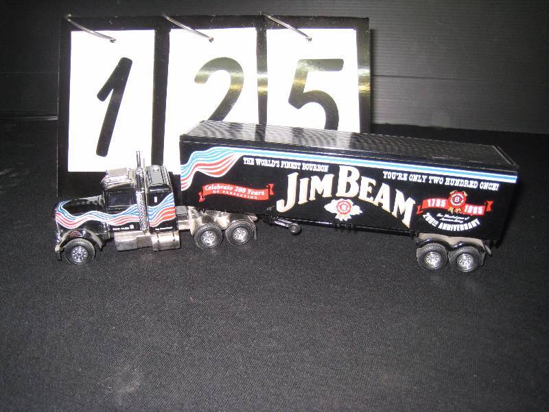 lot 125 image: Jim Beam Peterbilt semi truck model made by Matchbox, cargo doors open - Very Well Made