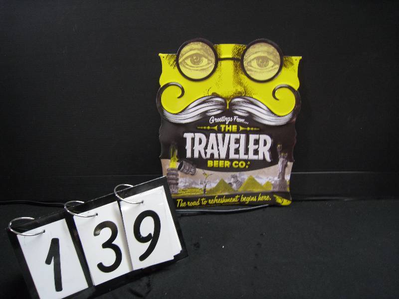 lot 139 image: The Traveler Beer Co tin sign