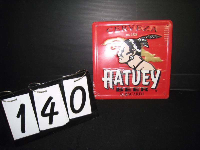 lot 140 image: Hatuey Beer, by Bacardi - tin sign, embossed - NEW, has protective film applied
