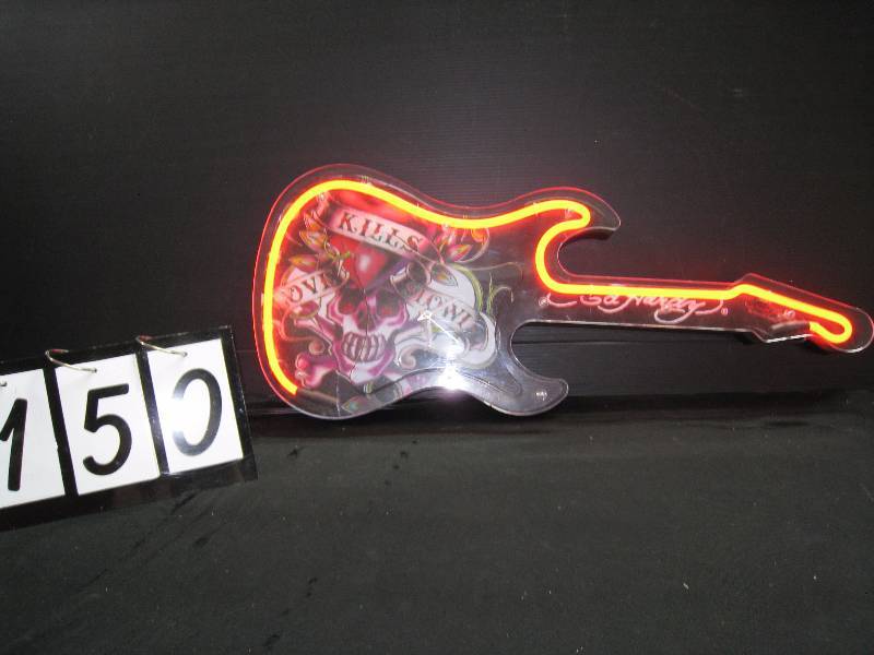 lot 150 image: Ed Hardy neon guitar  clock