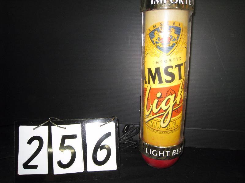 lot 256 image: Amstel Light barber pole - RARE sign - works great, graphics rotate