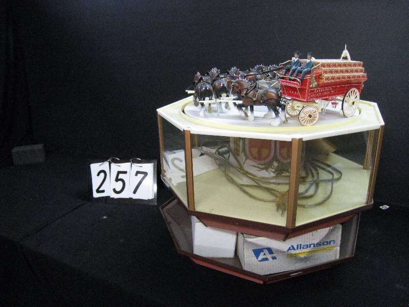 lot 257 image: Budweiser Carousel beer cart with clydesdale horses and dalmations - for parts only - all plastic parts in good condition, motor is bad