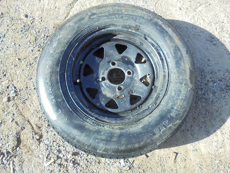 Tire RADIAL All Season Tire on 4 Hole Rim, P175/80R13 Barn Cleanout