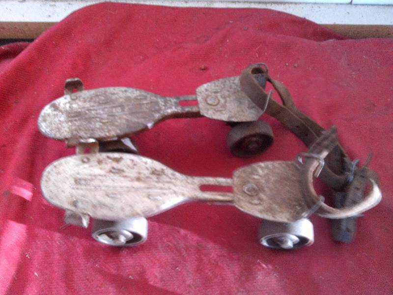 ANTIQUE IRON ROLLER SKATES