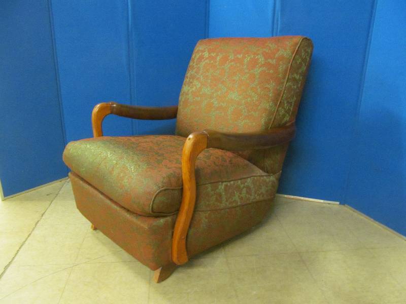 Vintage stuffed arm chair rocker