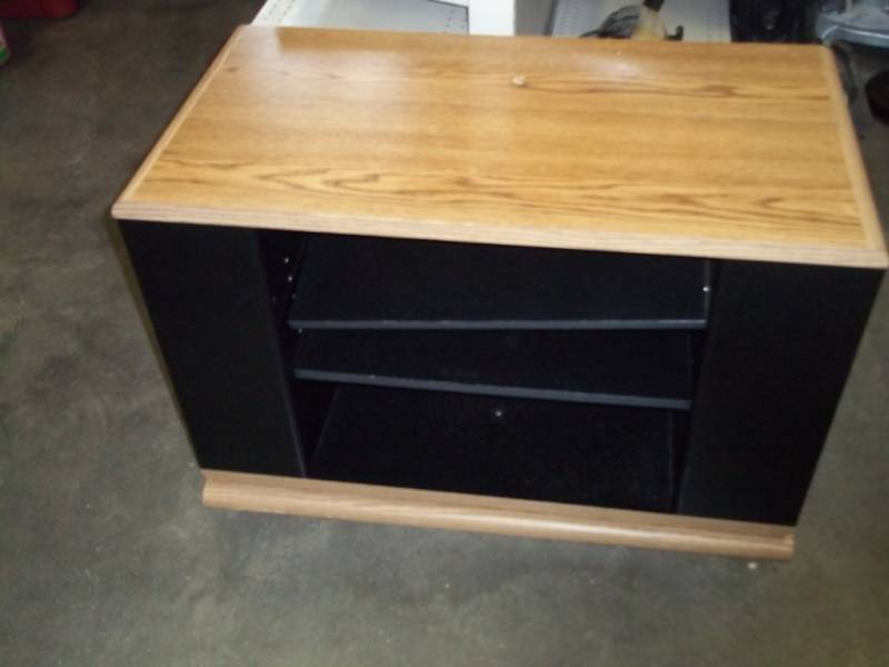 lot 32 image: TV Stand, swivels 36 x 18 x 22