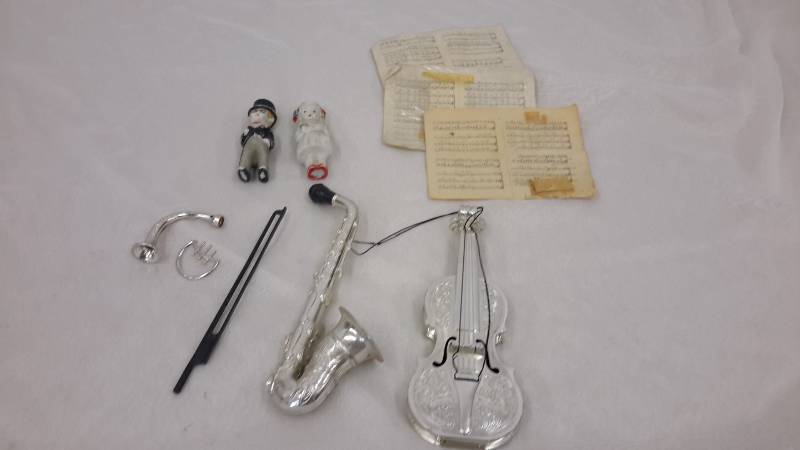 Antique cake toppers and musical toys
