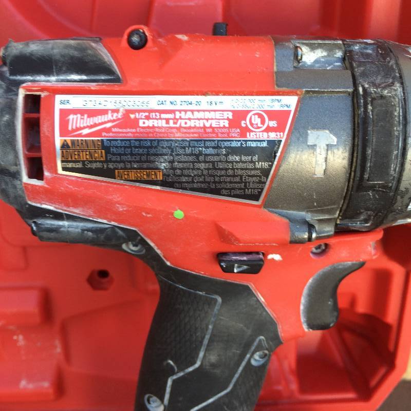 lot 3 image: Milwaukee  M18 FUEL 18-Volt Lithium-Ion Brushless 12 in. Hammer DrillDriver XC Kit Model # 2704-22 Used working conditions