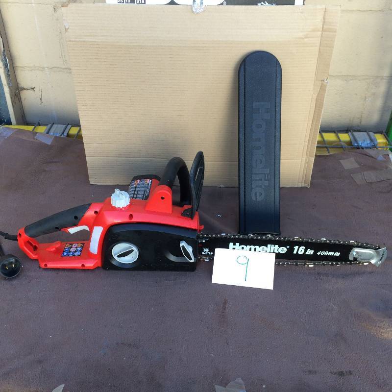 lot 9 image: Homelite 16 in. 12-Amp Electric Chainsaw in like New working conditions Model # UT43122B