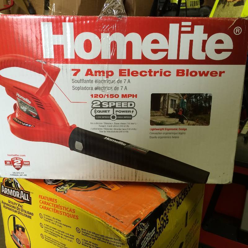 lot 29 image: Homelite 150 mph 233 CFM 7 Amp Electric BlowerSweeper in like New working conditions Model # UT42100B