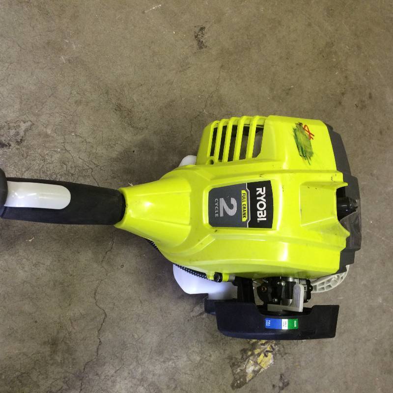 lot 31 image: Ryobi 2-Cycle 25cc Gas Full Crank Straight Shaft String Trimmer in like New working Conditions