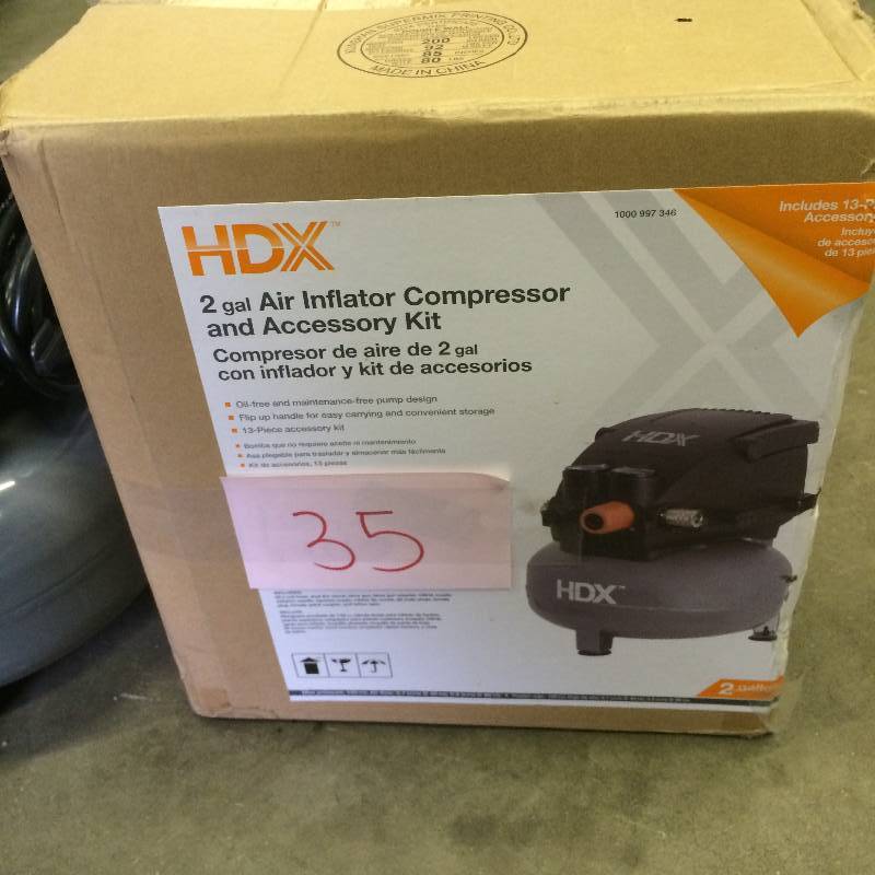 lot 35 image: HDX 2 Gal. Pancake Air Compressor in like New working conditions