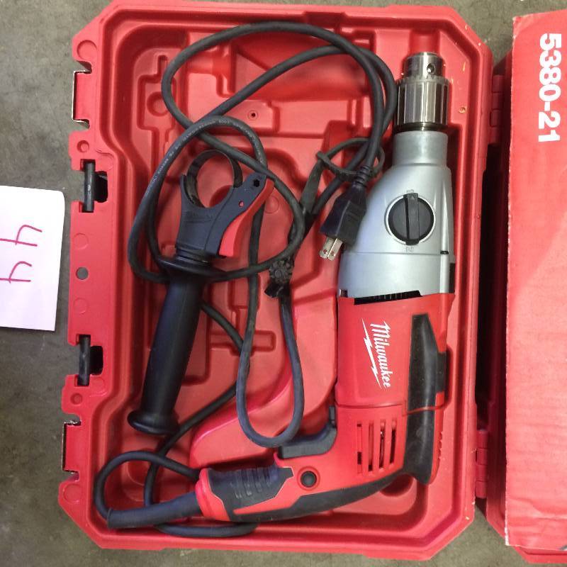 lot 44 image: Milwaukee 12 in. Heavy-Duty Hammer Drill Model # 5380-21 in Like New working conditions