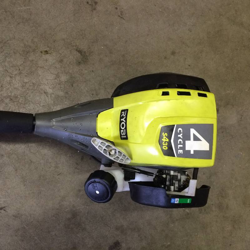 lot 48 image: Ryobi 4-Cycle 30cc Attachment Capable Straight Shaft Gas Trimmer in New conditions Working