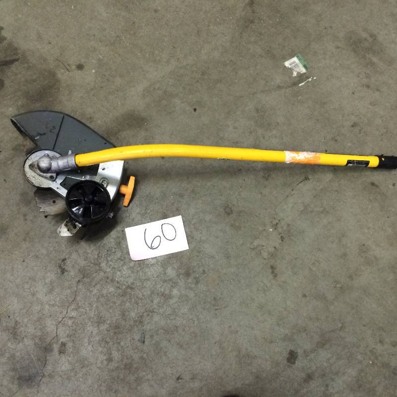 lot 60 image: Ryobi Expand-It 9 in. Universal Straight Shaft Edger Attachment for String Trimmer Used