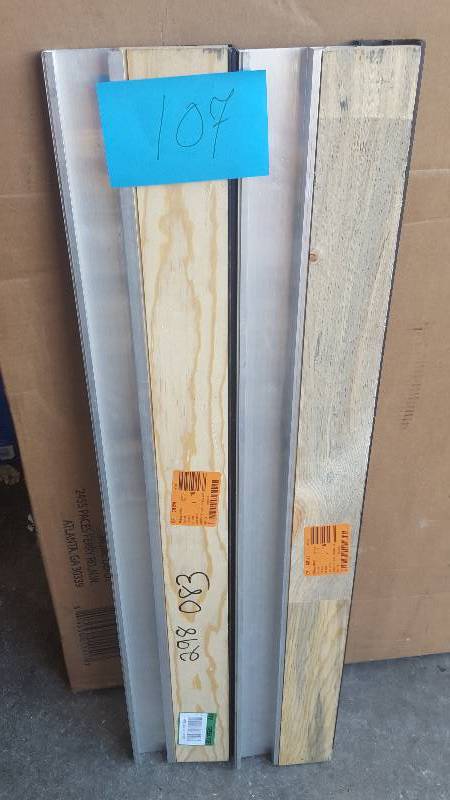lot 107 image: Lot of 2 EO 5-58 in. x 3 ft. Silver& Brown Fixed Sill Threshold New