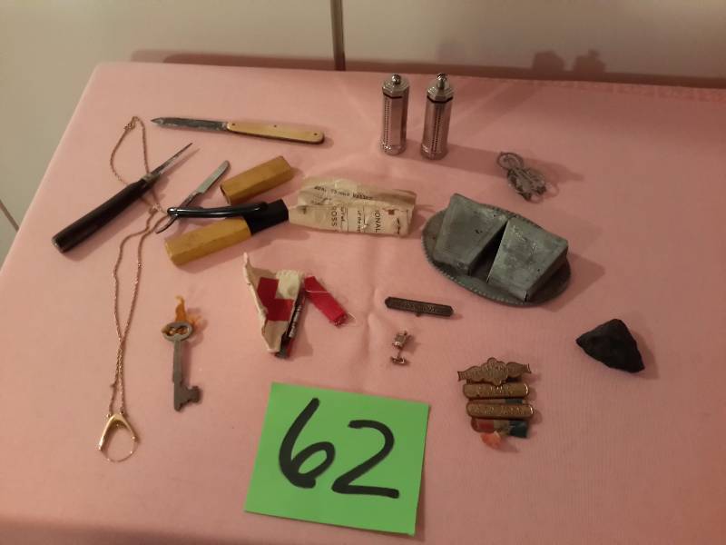 Misc. Collectible Items  1 straightedge razor, 2 jack knives, arrowhead, coin container for dimes.. B and R Manufacture NY.. Key to city of La Crosse, Red Crosss WWI Stripes and certificate for 3100  hours of volunteering.. Necklace.