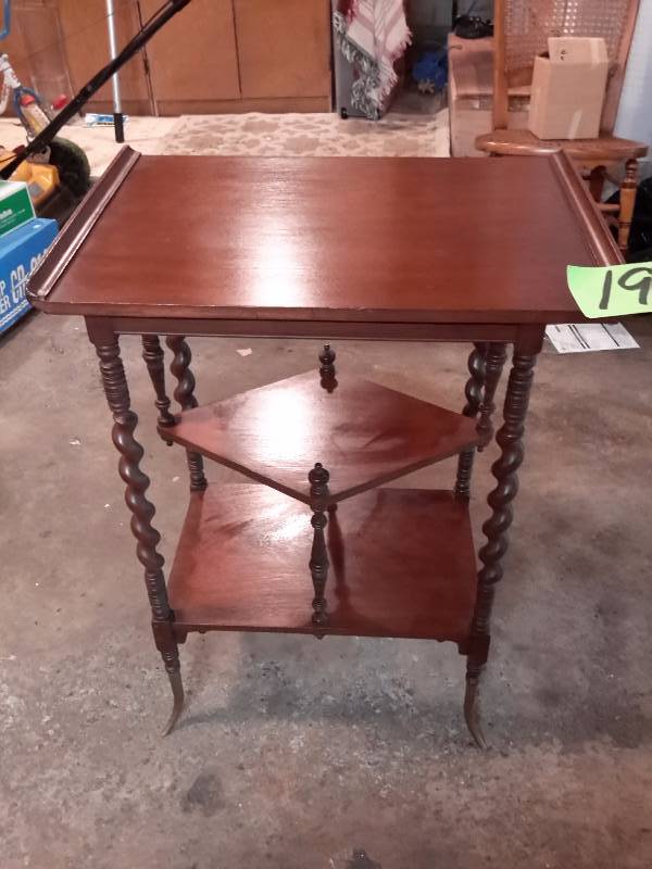 Nice Occasional Table.. Walnut wood.. Has BRASS ends to legs. Twisted legs.. 22in x 16in x 30in.