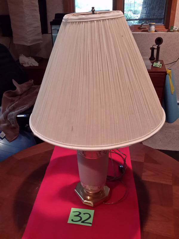 Nice table lamp.. Green Base with White and gold trim.. Brass base. 1950s.