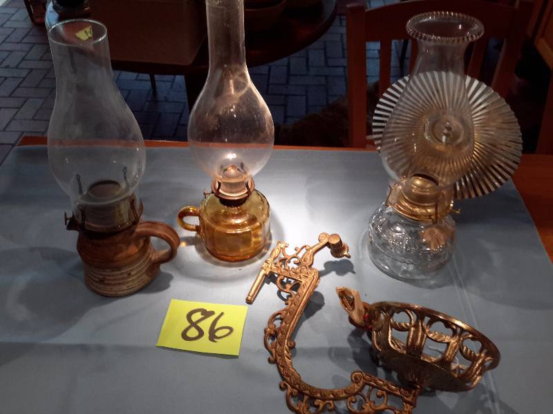 3 Kerosene Lamps.. 1 with reflector.. 1 with yellow depression glass look base, 1 with pottery base, 1 wall bracket for kerosene lamp