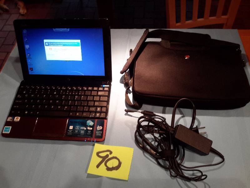 ASUS Mini Eee PC.. 217 GB hard drive.. Windows 7 Home premium.. Has Charger and Case.