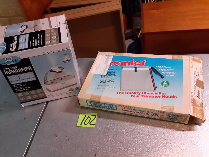 Humidifier (cool)  Used one time  Paper Cutter.